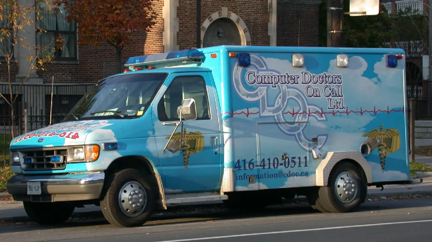 The CDOC ambulance, liveried with the Computer Doctors On Call name and phone number